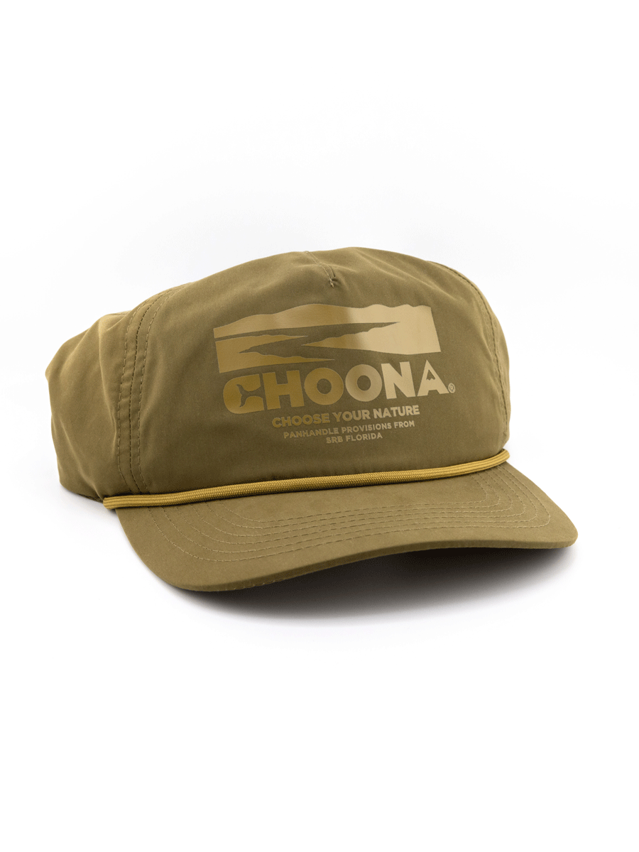 The Dune Lake Snapback by Choona is an olive-green cap with a flat brim, yellow graphic of hills and dune lakes, CHOONA above the slogan Choose Your Nature, yellow brim accent, and UV Lite protection.