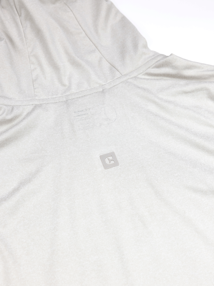 A close-up of the back of the Choona Grayton Ultra-Lightweight Hoodie in light gray features a small square C logo near the upper back. The smooth fabric is designed for breathable performance.