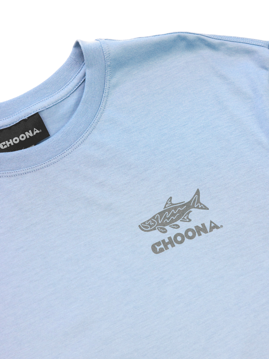 The Choona Tarpon Graphic Tee features a light blue color, black and white fish graphic with CHOONA. below on the left chest, 100% Pima cotton fabric, and a black CHOONA. tag at the collar.