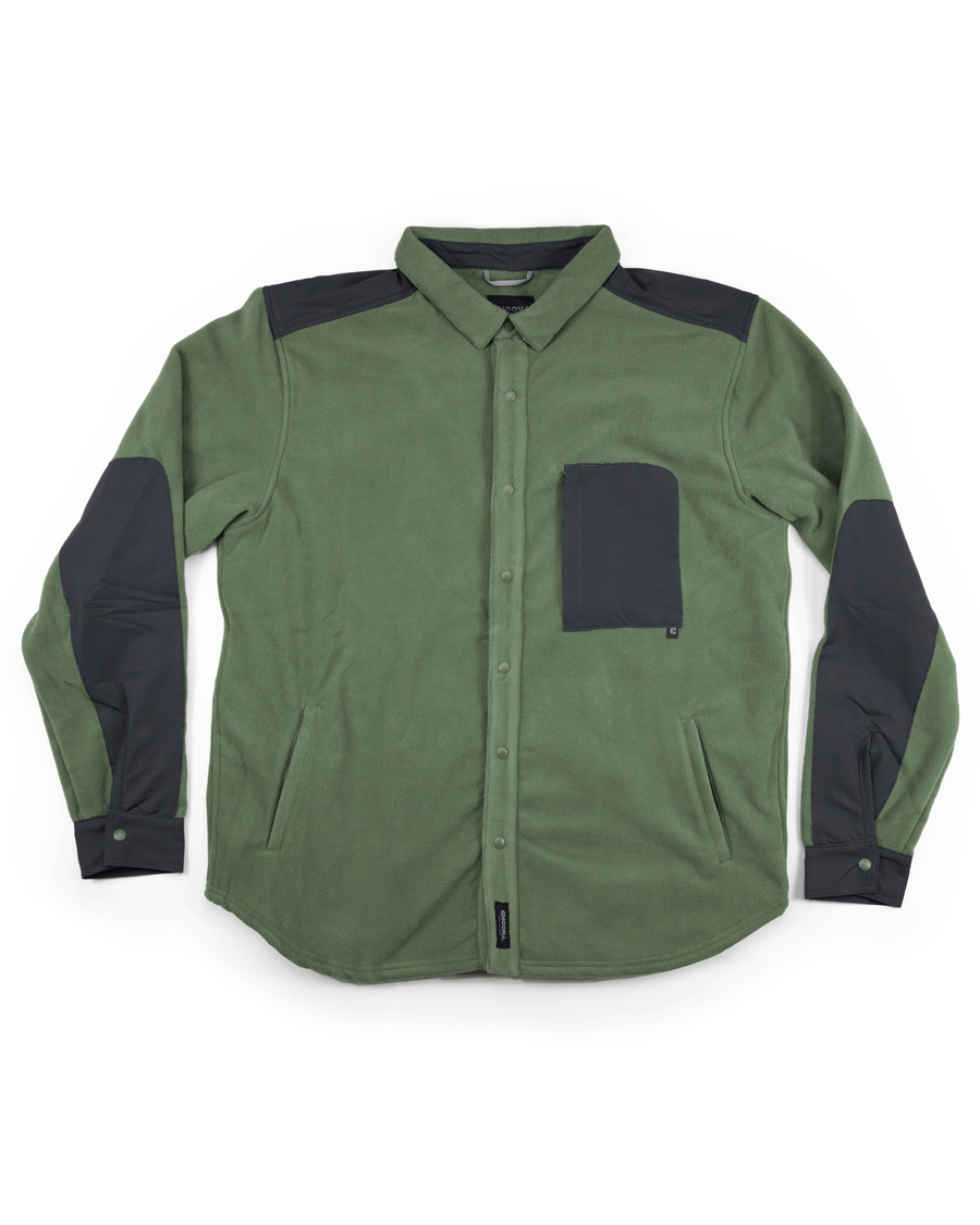 A green Choona Skipper Shacket with long sleeves, button-up front, and black accents on shoulders, elbows, and chest pocket—made from recycled polyester—is laid flat on a white background.