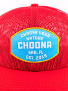 A close-up of the Breezy Snapback - Red by Choona, a mesh baseball cap with a blue and yellow patch reading CHOOSE YOUR NATURE CHOONA SRB, FL EST. 2019.