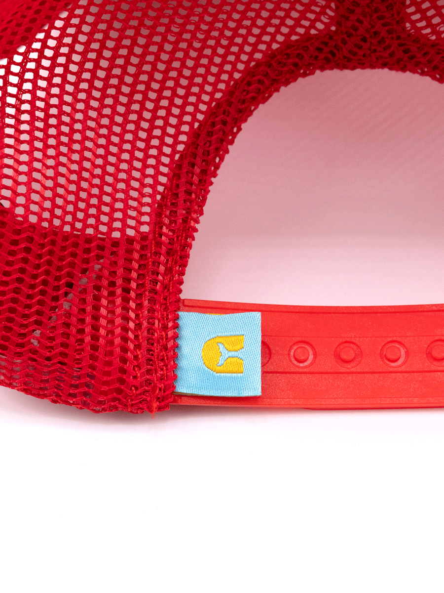 Close-up of the back of Choona’s Breezy Snapback - Red, featuring a mesh body, adjustable snap closure, and a small blue tag with a yellow C sewn near the clasp.