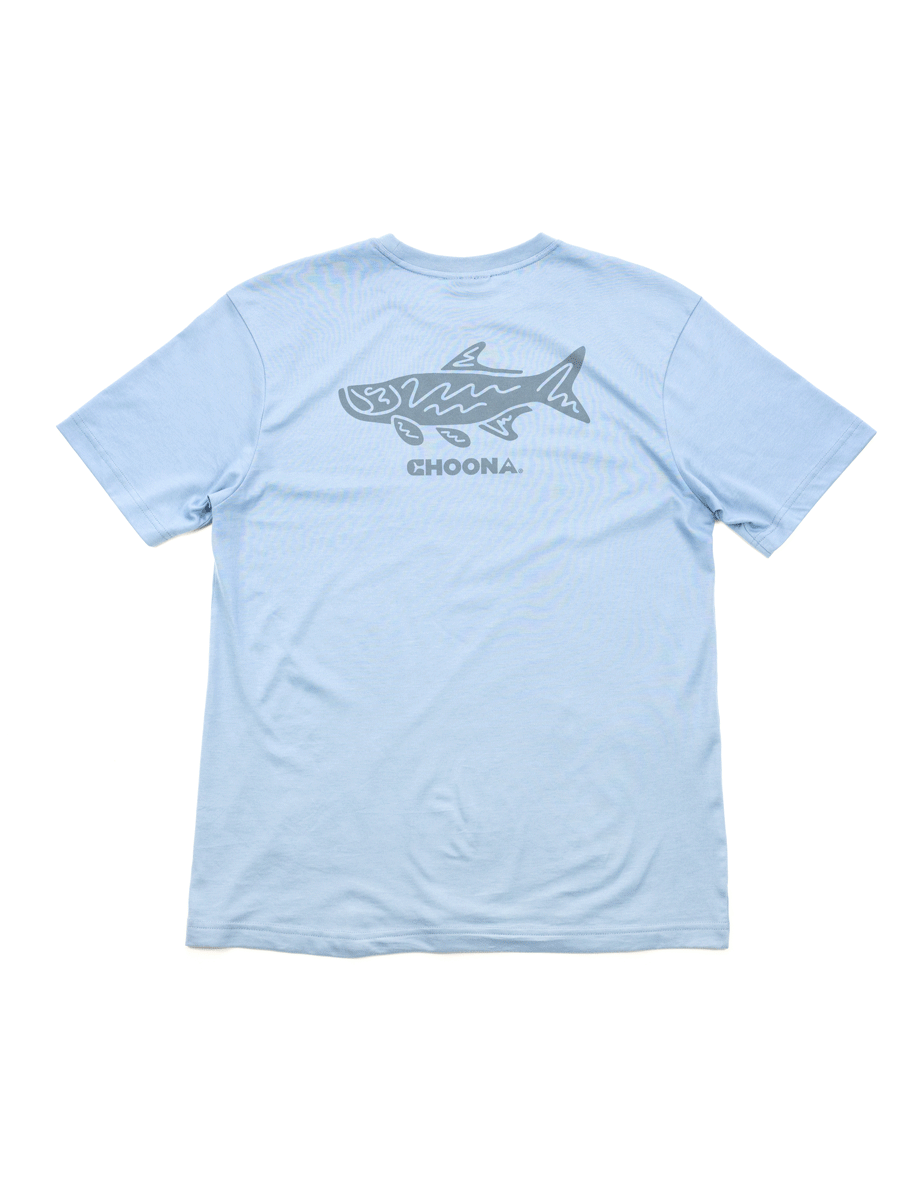 The Choona Tarpon Graphic Tee is a light blue, short-sleeve t-shirt with a large gray shark graphic and CHOONA screen-printed on the back, made from 100% Pima Cotton for softness—perfect for fans of Tarpon Graphic Tee styles.