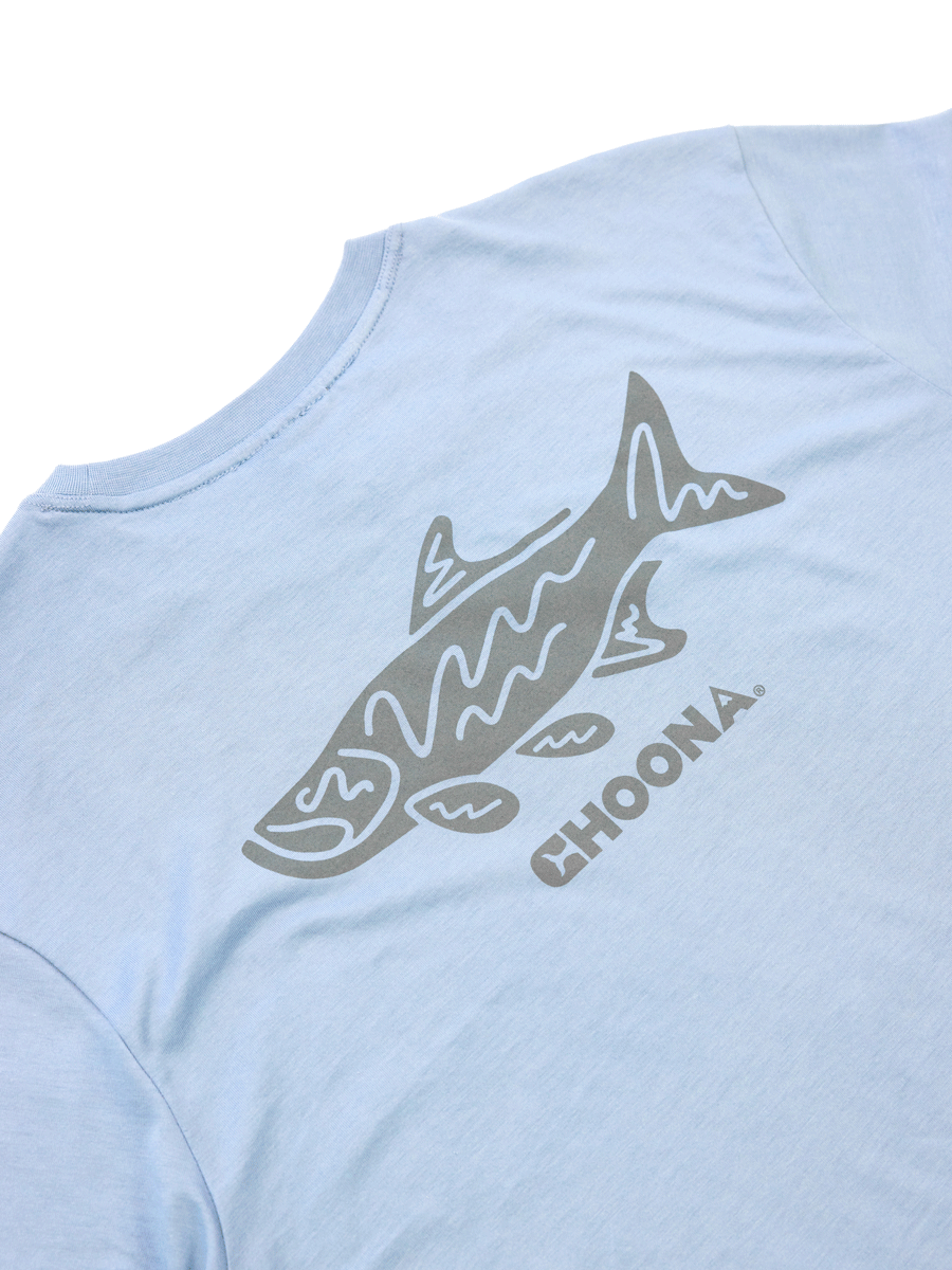 The Choona Tarpon Graphic Tee features a light blue color, a stylized fish and CHOONA in gray screen-printed on the back, and is crafted from 100% Pima Cotton for superior comfort.