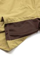 Close-up of the Choona Shore Short hem, highlighting detailed stitching and the inner brown mesh lining, crafted for coastal activities with advanced wicking technology.