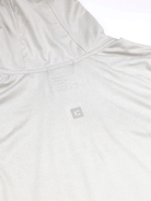 A close-up of the back of the Choona Grayton Ultra-Lightweight Hoodie in light gray features a small square C logo near the upper back. The smooth fabric is designed for breathable performance.