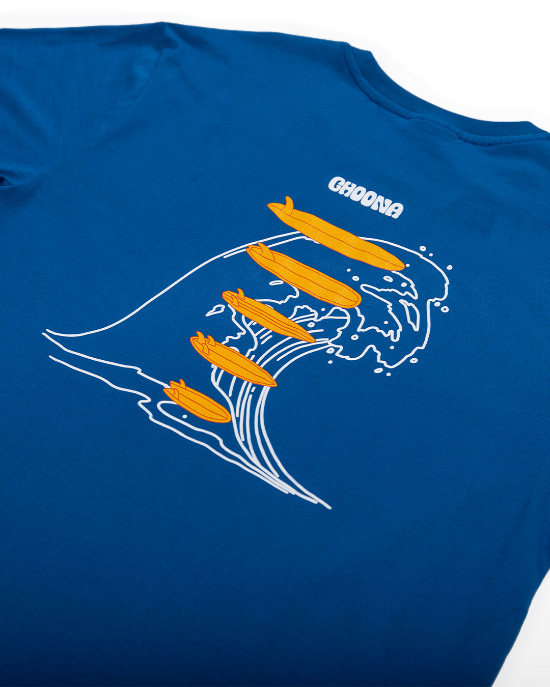 The Choona Swell Dweller Graphic Tee features a blue design with white line art waves, orange submarines, surf-inspired style, and "CHOONA" printed above—a perfect surfer shirt vibe.