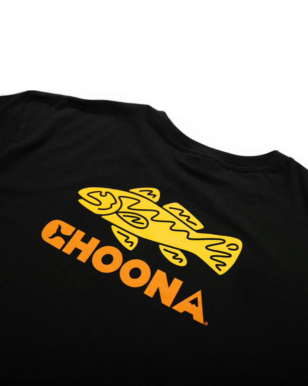 The Choona Redfish Graphic Tee features a bold yellow fish image above "CHOONA" in orange on the back. This comfortable shirt is made from soft USA-grown cotton and is displayed laid flat to highlight its striking design.