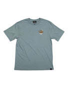 The Choona Armachillo Graphic Tee is a light blue short-sleeve retro surf shirt with a small brown graphic and "Google" on the left chest, made from USA-grown cotton. The tee is shown laid flat on a white background.